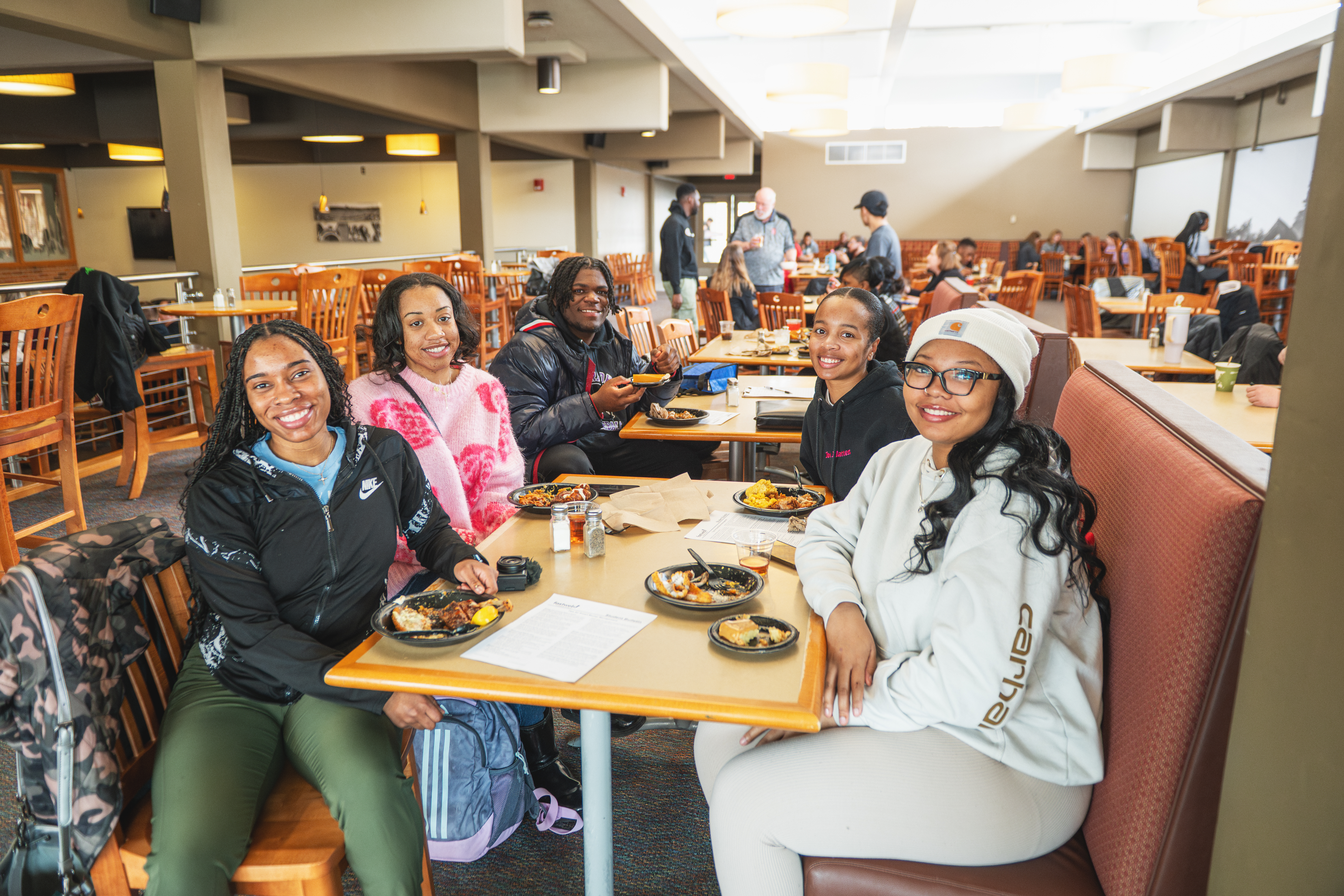 people enjoying a meal at taste of soul